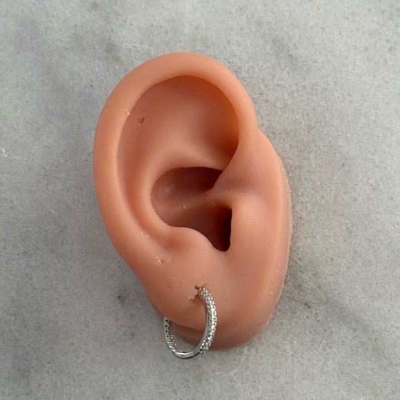 Modest Lu Jewelry - Sterling Silver All Around Crystal Hoop Earrings
Brand New